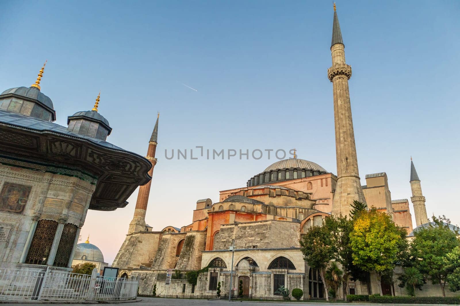 Hagia Sophia domes and minarets in Sultanahmed, old town of Istanbul, Turkey, at sunrise.