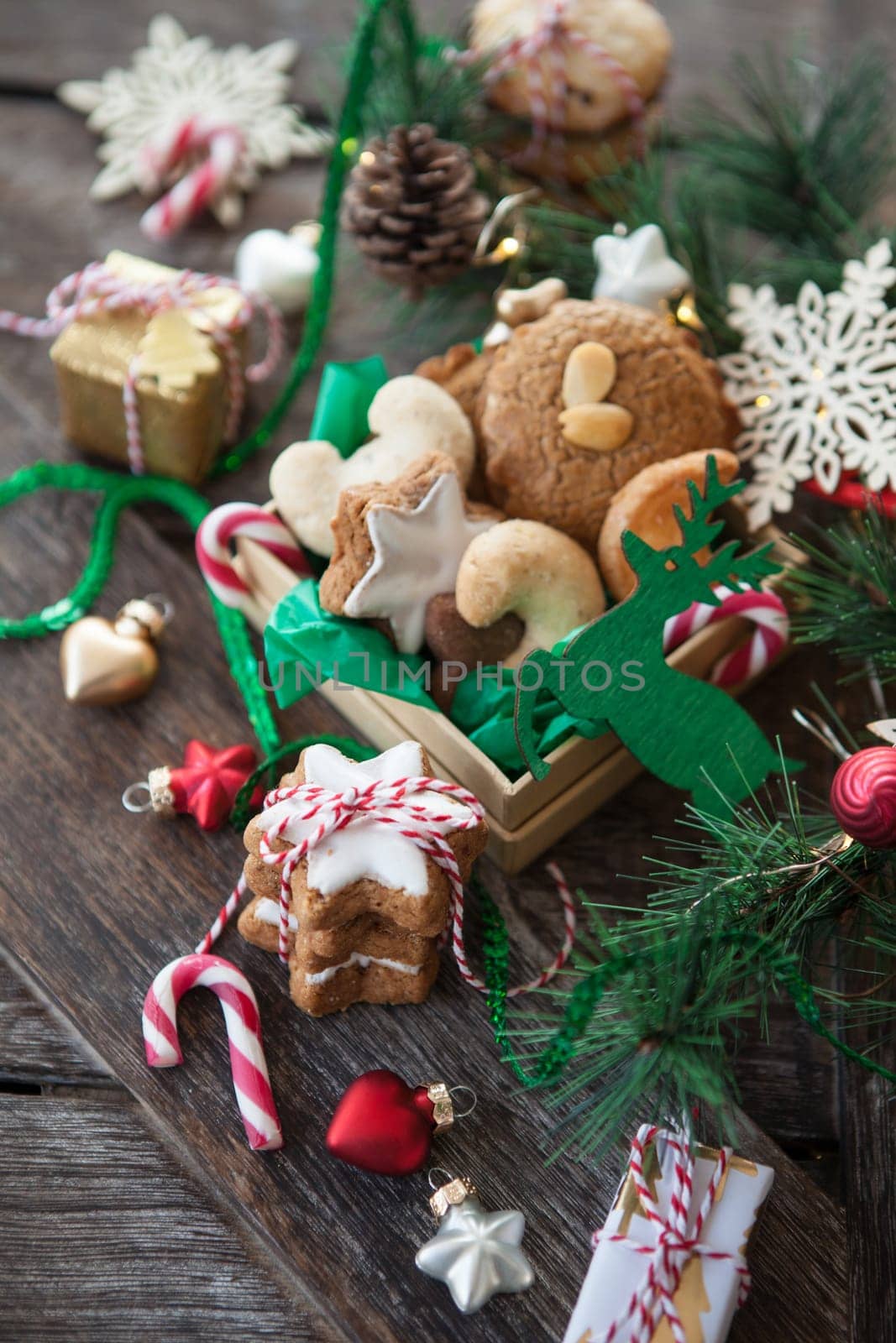 Variety of Christmas cookies and festive holidays decorations