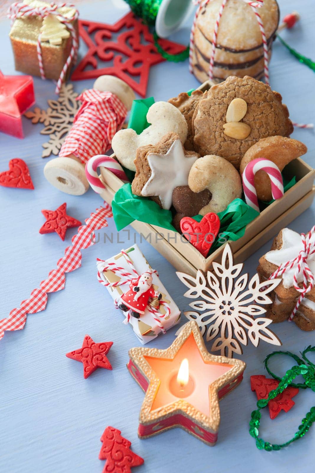 Variety of Christmas cookies and festive holidays decorations