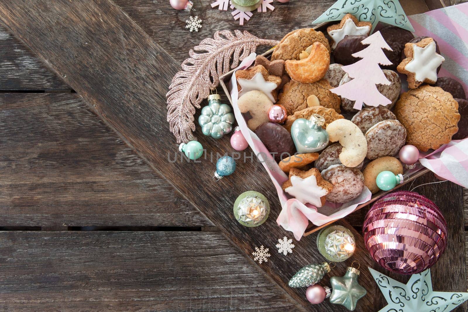Variety of Christmas cookies and festive holidays decorations
