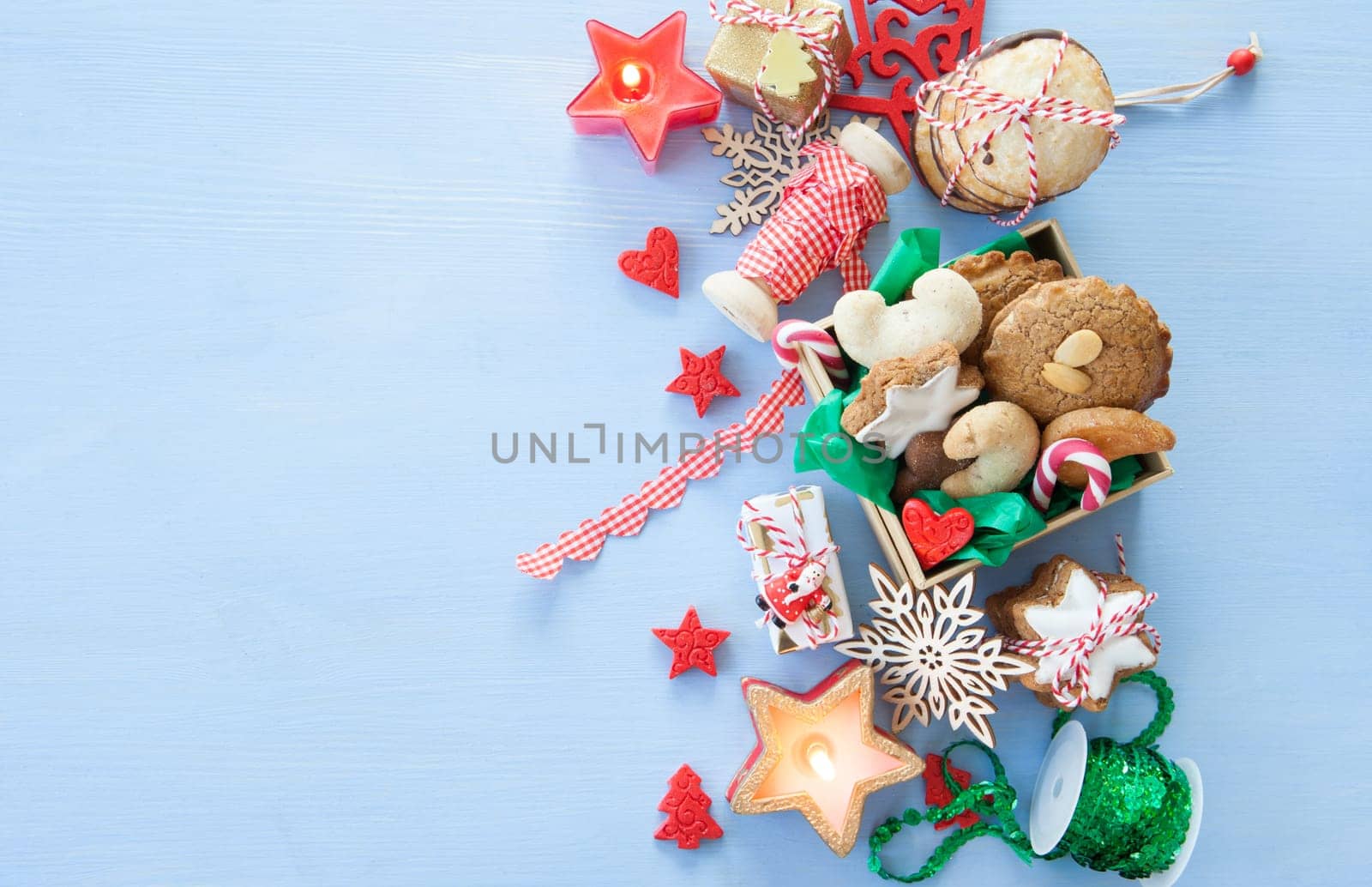 Variety of Christmas cookies and festive holidays decorations