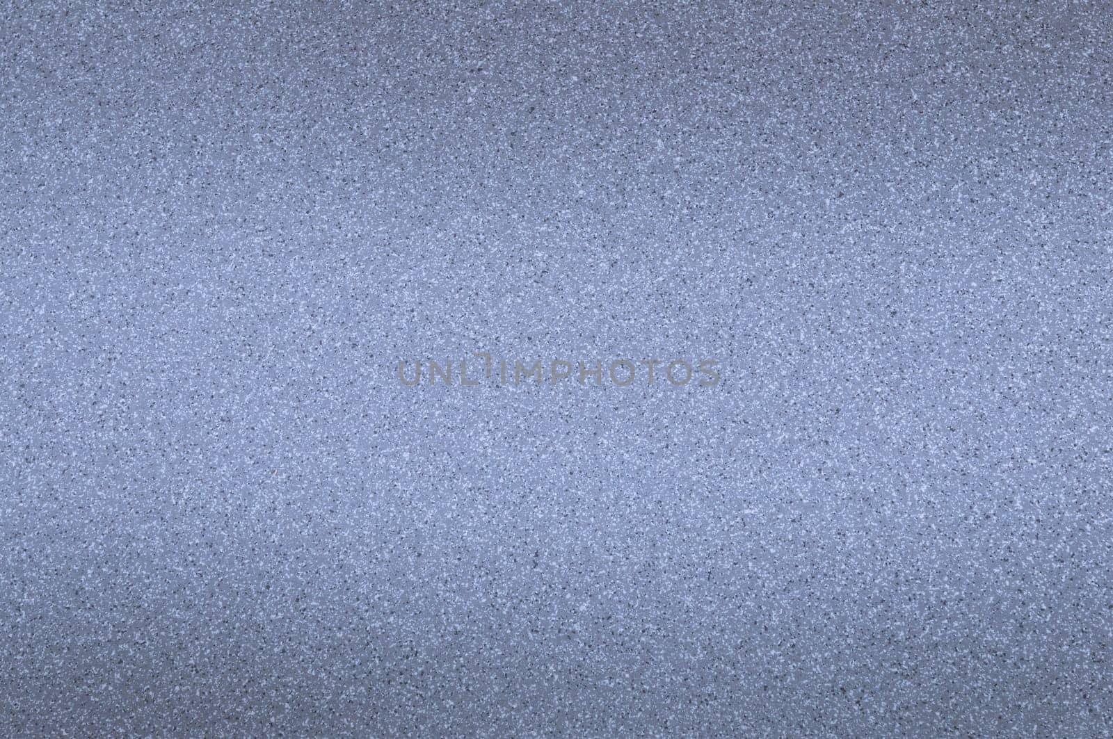 The granite background is light blue with small dots.