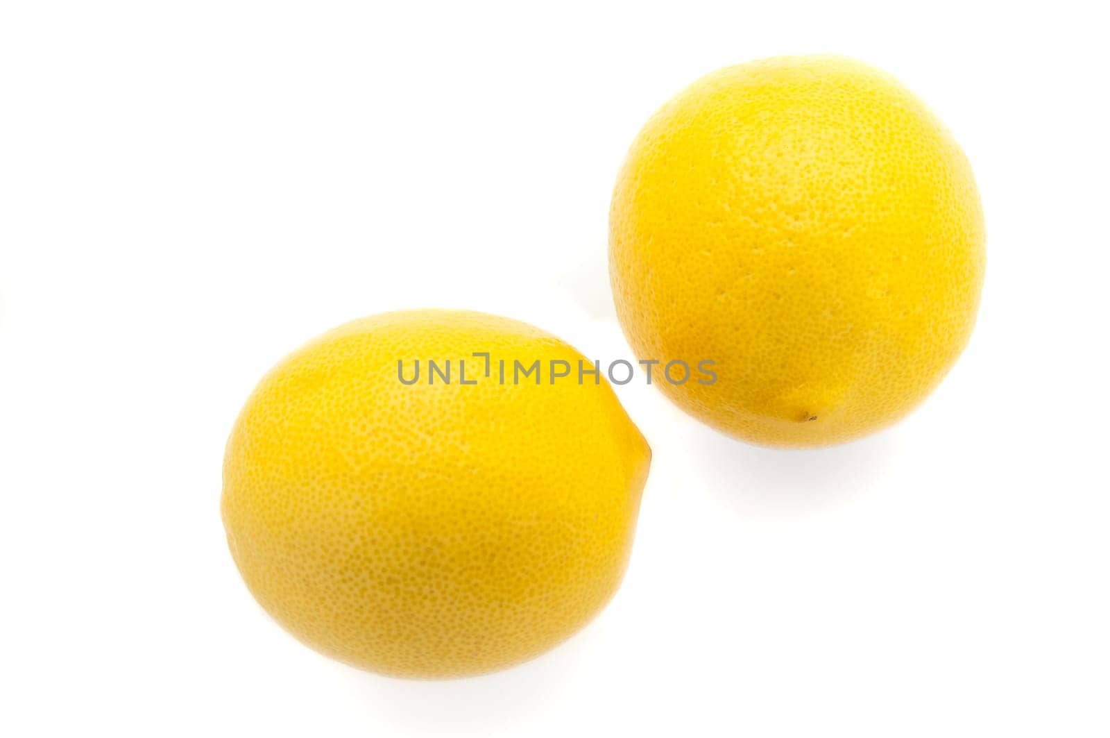 Creative layout made of lemon and leaves. Flat lay. Lemon on white background.