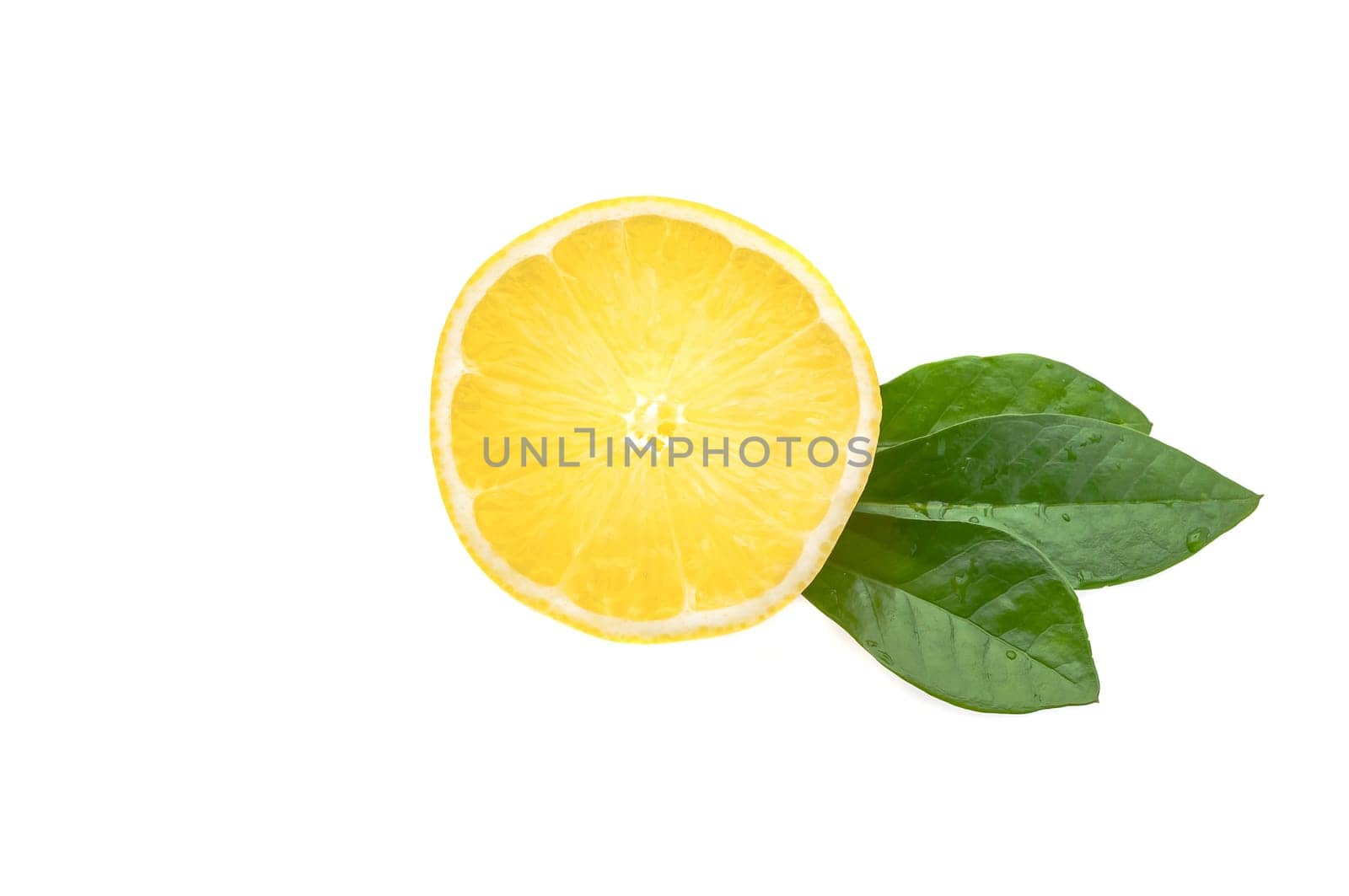 Half of a fresh, clean, glowing yellow lemon with green leaves on a white background.