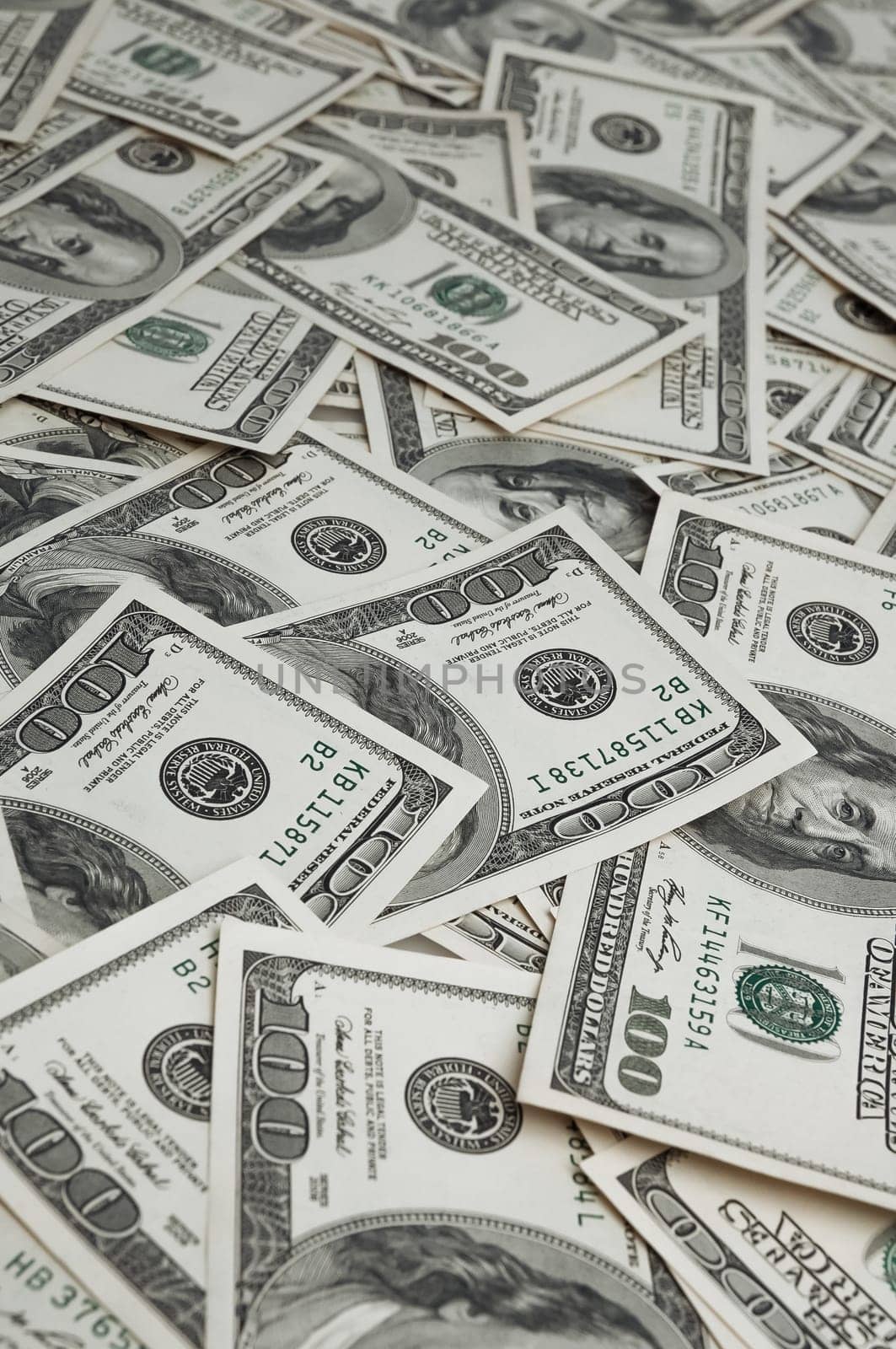 A background of one hundred dollar bills.