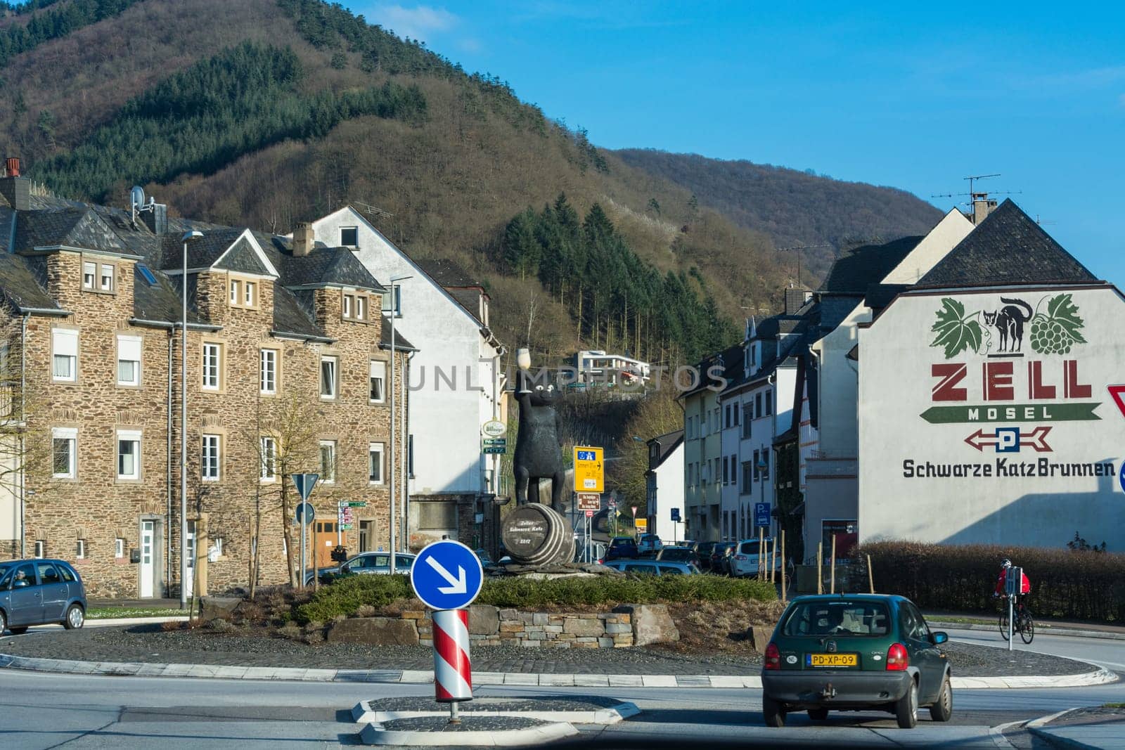ZELL, GERMANY - MARCH 26, 2016: Entrance to Zell am Mosel with roundabout and view of the symbol and logo for the famous wine of Zell, Moselle, Rhineland-Palatinate, Germany, Europe.