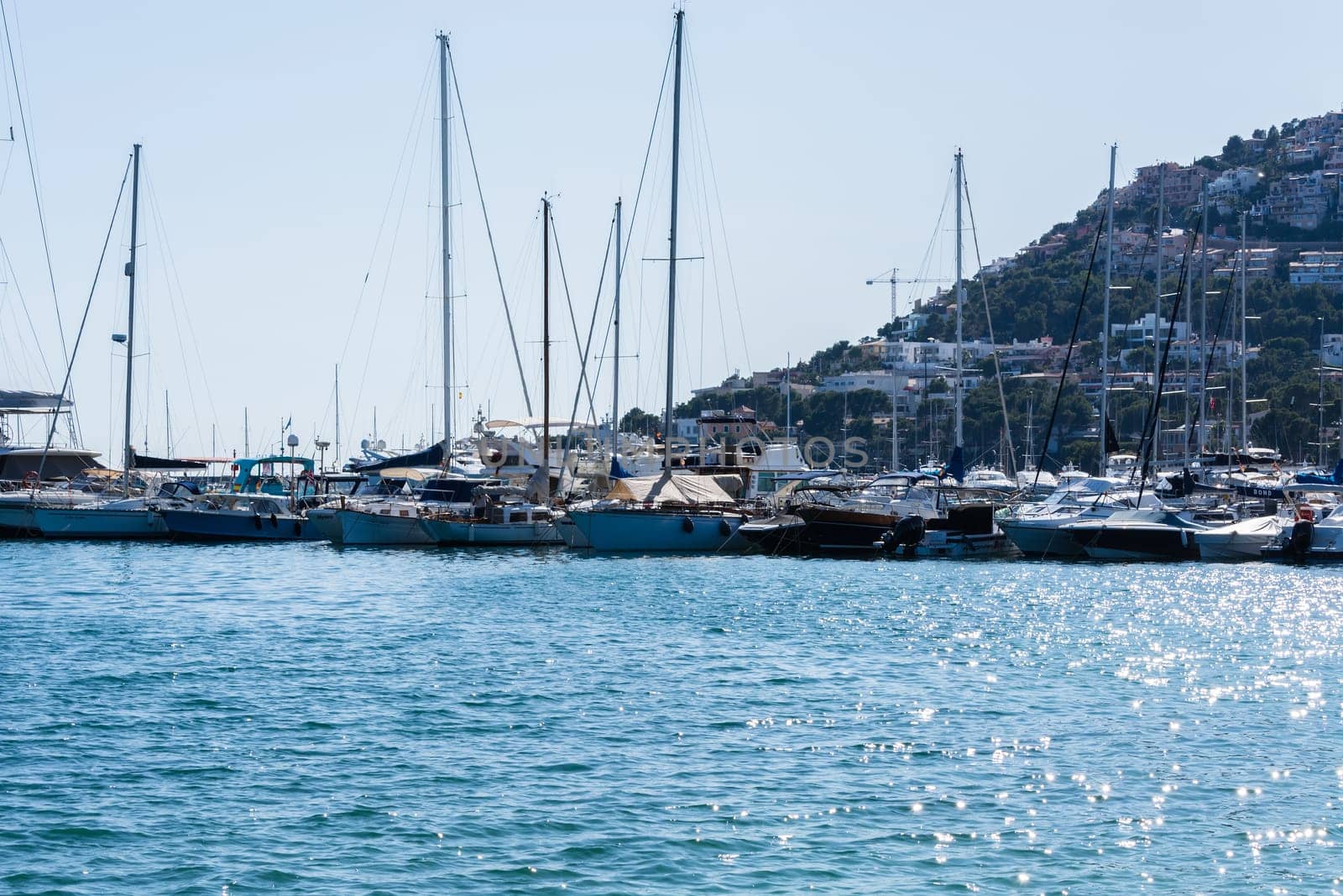 PORT ANDRATX, SPAIN - JUNE 01, 2016:.View of the Bay of Port Andratx Mallorca Baleares Spain. In the background motor boats and sailboats.