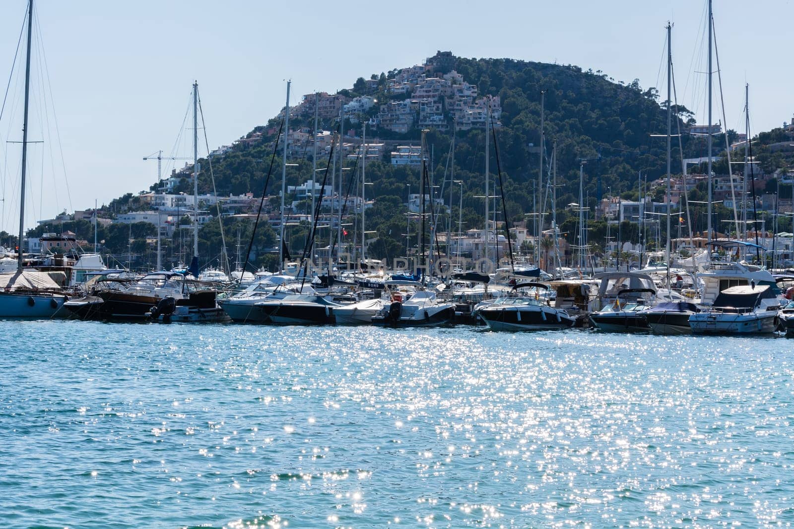 PORT ANDRATX, SPAIN - JUNE 01, 2016:.View of the Bay of Port Andratx Mallorca Baleares Spain. In the background motor boats and sailboats.
