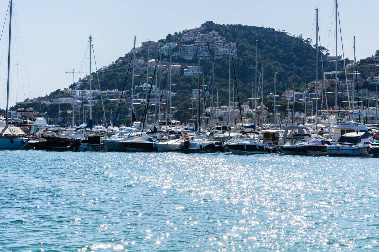 PORT ANDRATX, SPAIN - JUNE 01, 2016:.View of the Bay of Port Andratx Mallorca Baleares Spain. In the background motor boats and sailboats.