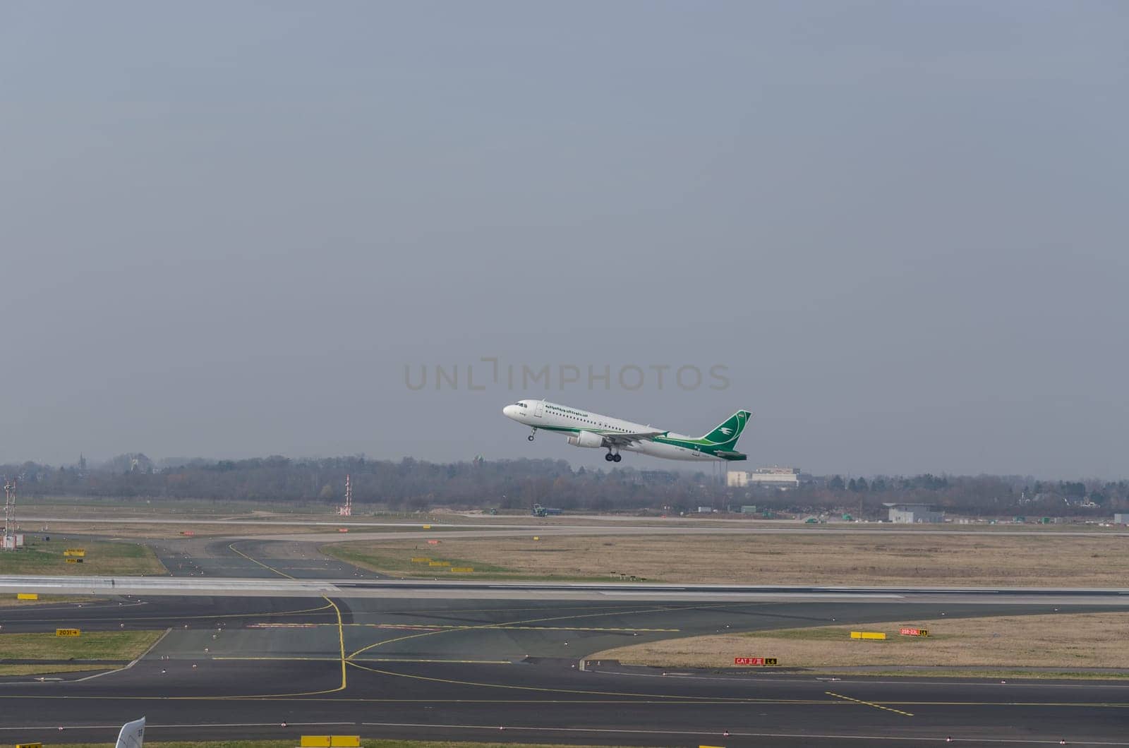 Dusseldorf, NRW, Germany - March 18, 2015: Airbus A321 of Irak Airlines at startup on the Dusseldorf airport.