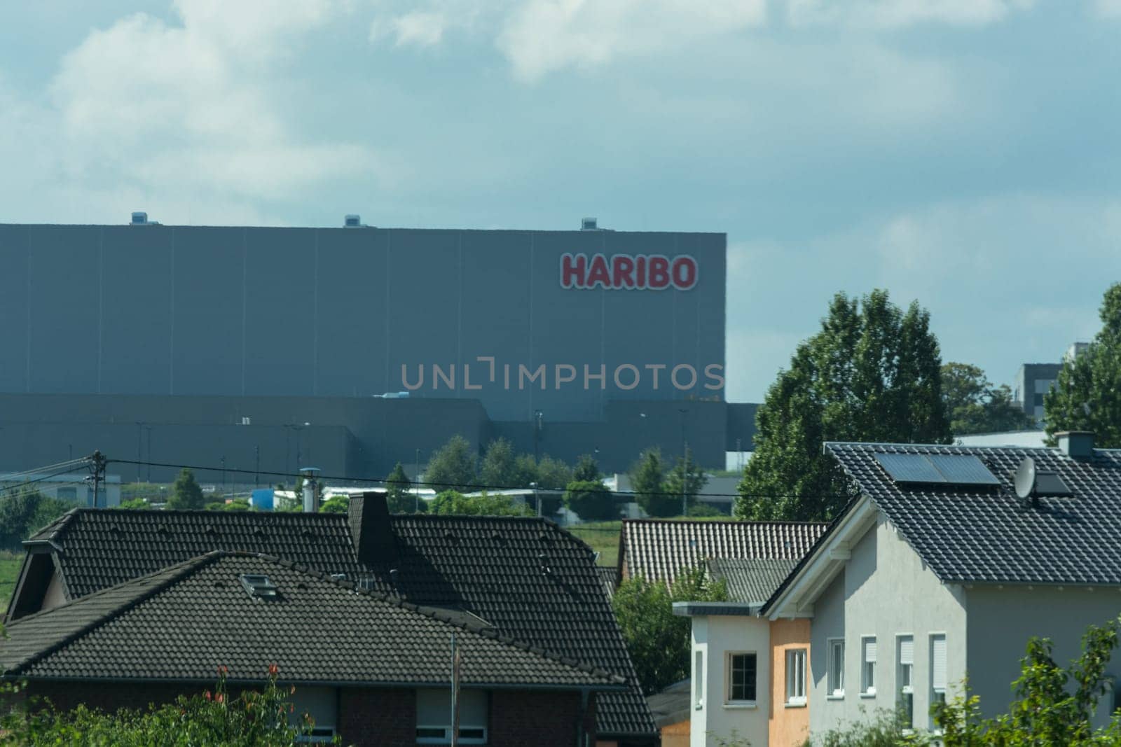 BONN  GERMANY - AUGUST 13  2017:Building of the company Haribo-Holding GmbH & Co. KG photographed a German confectionery group based in Bonn from the A 61 motorway