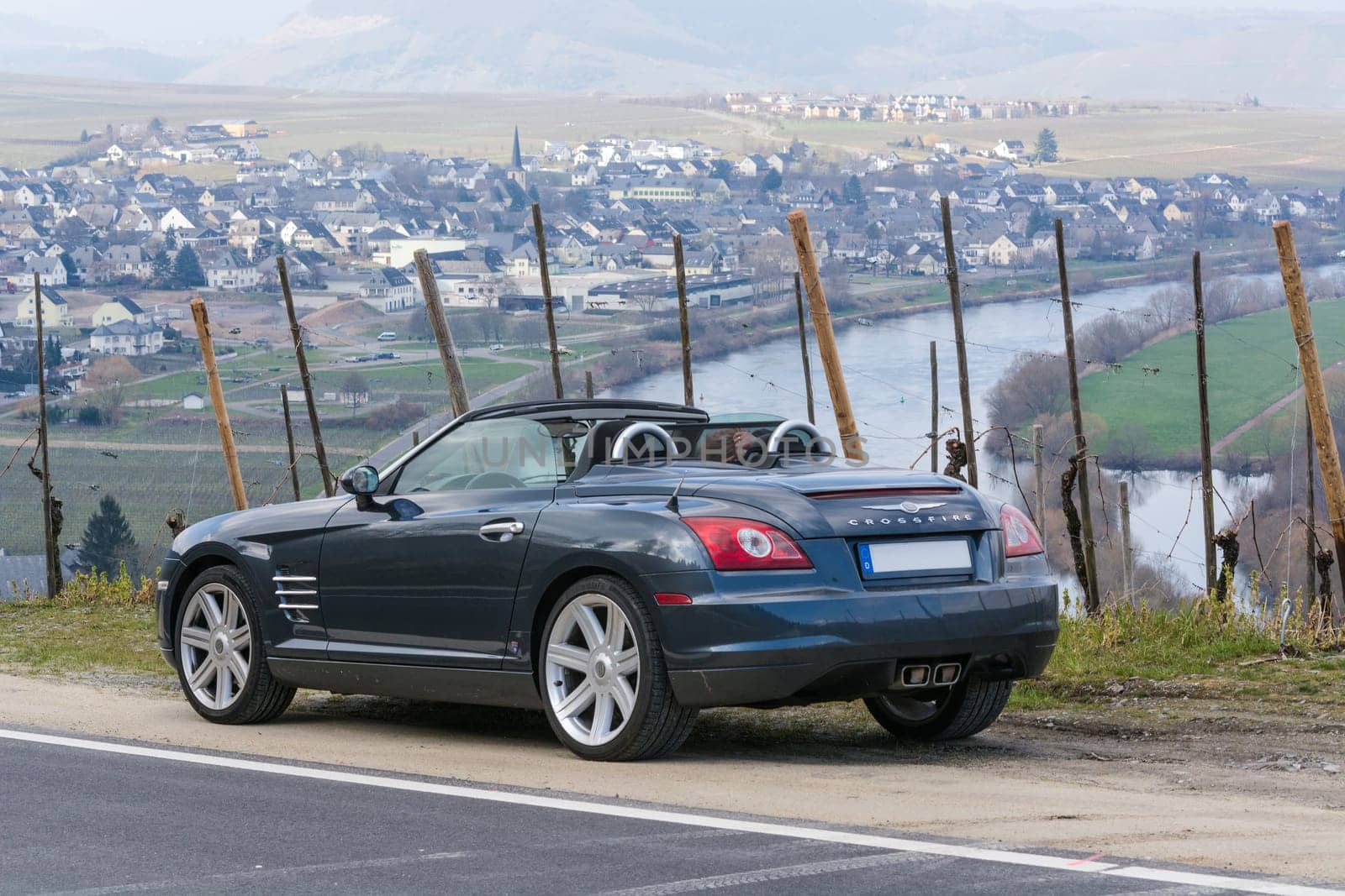 LEIWEN, GERMANY - MARCH 26, 2016:.Chrysler Crossfire on the Panorama Trail in the vineyards of Leiwen an der Mosel.