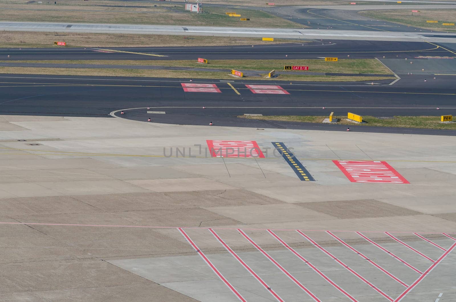 Duesseldorf, Nrw, Germany - March 18, 2015: View of the rolling field of the airport Duesseldorf Lohhausen..Runway and Landing strip with makings