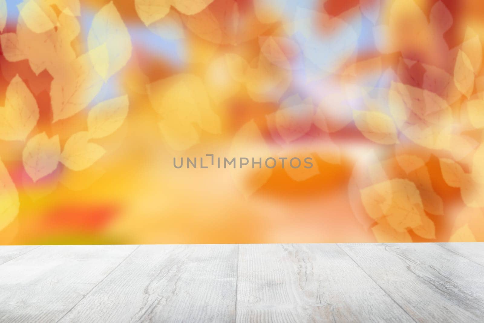 Empty table top autumn background. Empty rustic wooden bright table top in front of beautiful abstract golden autumn background. Template for product display montage. Space.