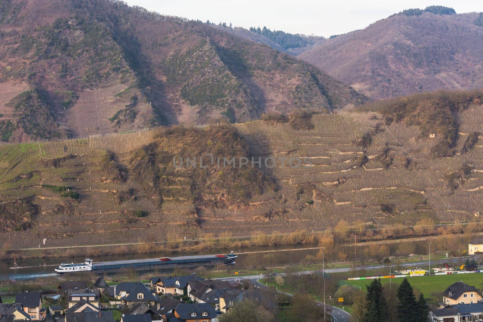 MOSELTAL, GERMANY - MARCH 26, 2016:.Panoramic view over the Moselle valley in the background the vineyards and the River Moselle.