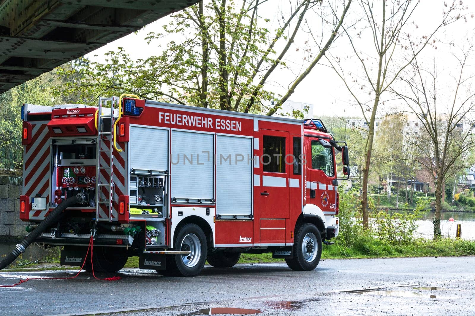 ESSEN KETTWIG, NRW, GERMANY - APRIL 28, 2016:.Fire fighter trainer use in Essen Kettwig, Germany. Firefighters in Uniform during training.
