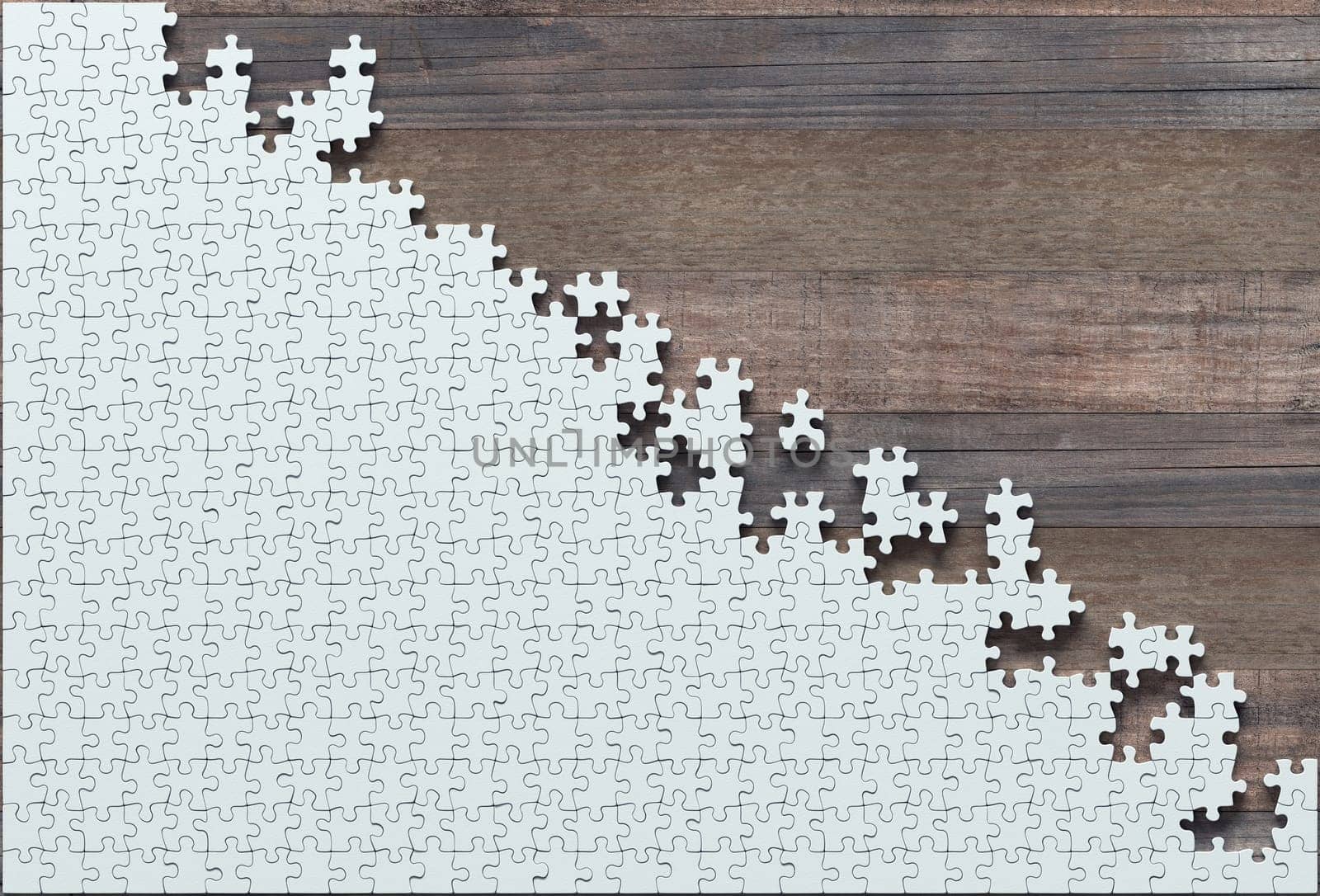 Blank jigsaw puzzle missing half to finish. Concept of work not completed.
