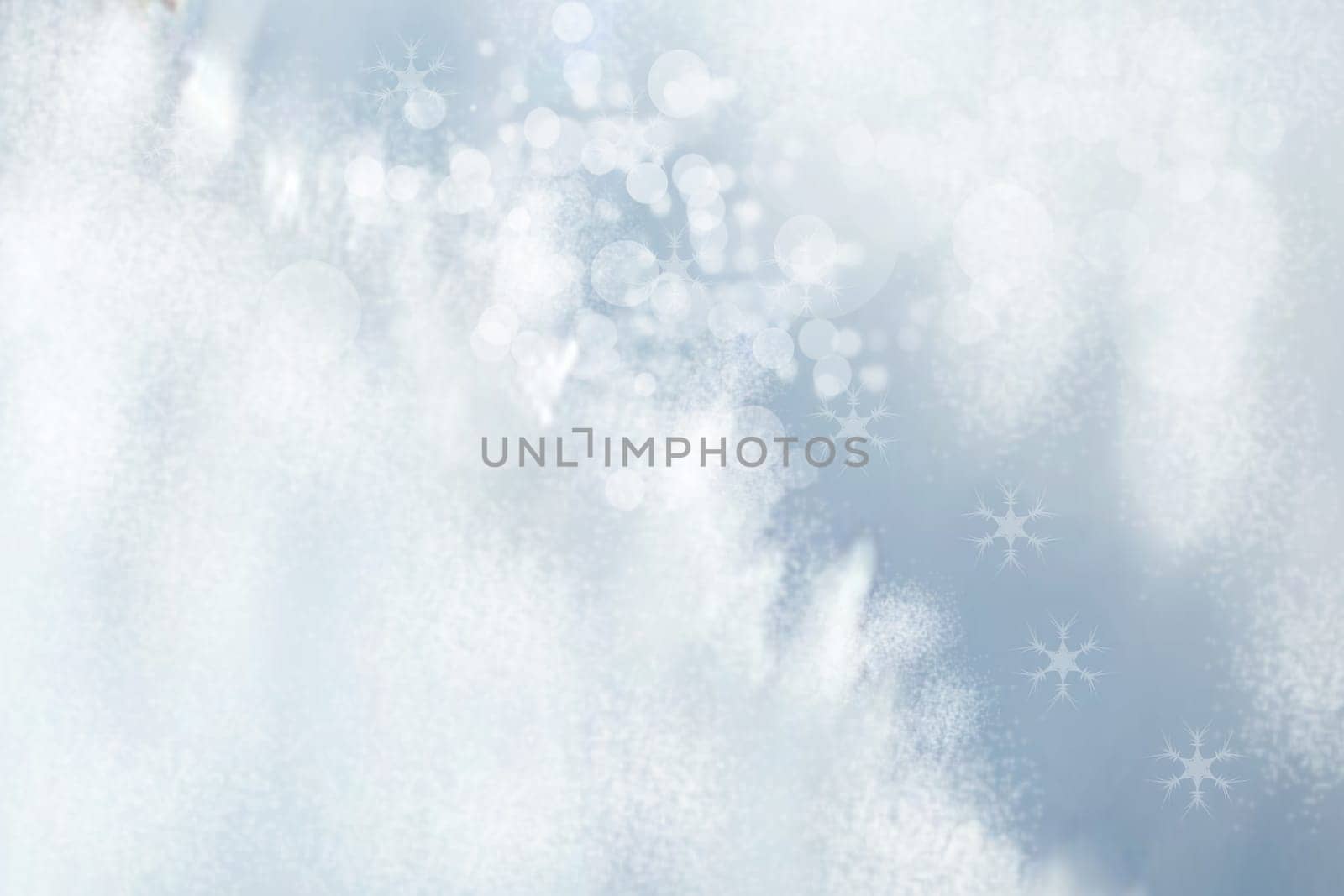 Abstract blurred festive winter christmas or Happy New Year background with shiny blue and white bokeh lighted snow landscape. Space for your design. Card concept.