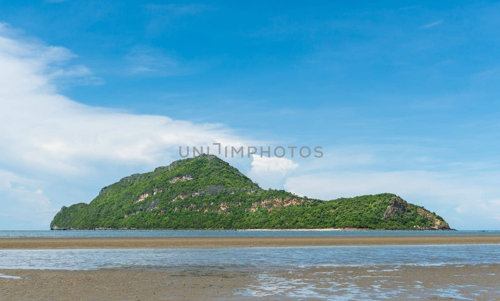 Ko Kho ram at Sam Roi Yod Beach Prachuap Khiri Khan Thailand with blue sky and cloud. Rock or stone mountain or hill. Landscape or scenery for .summer season concept