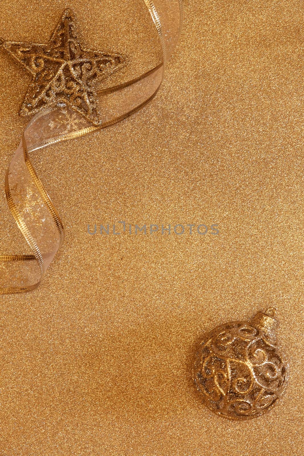 Christmas decorations on a golden background with copy space for text. Top view. Christmas and New Year. Greeting card
