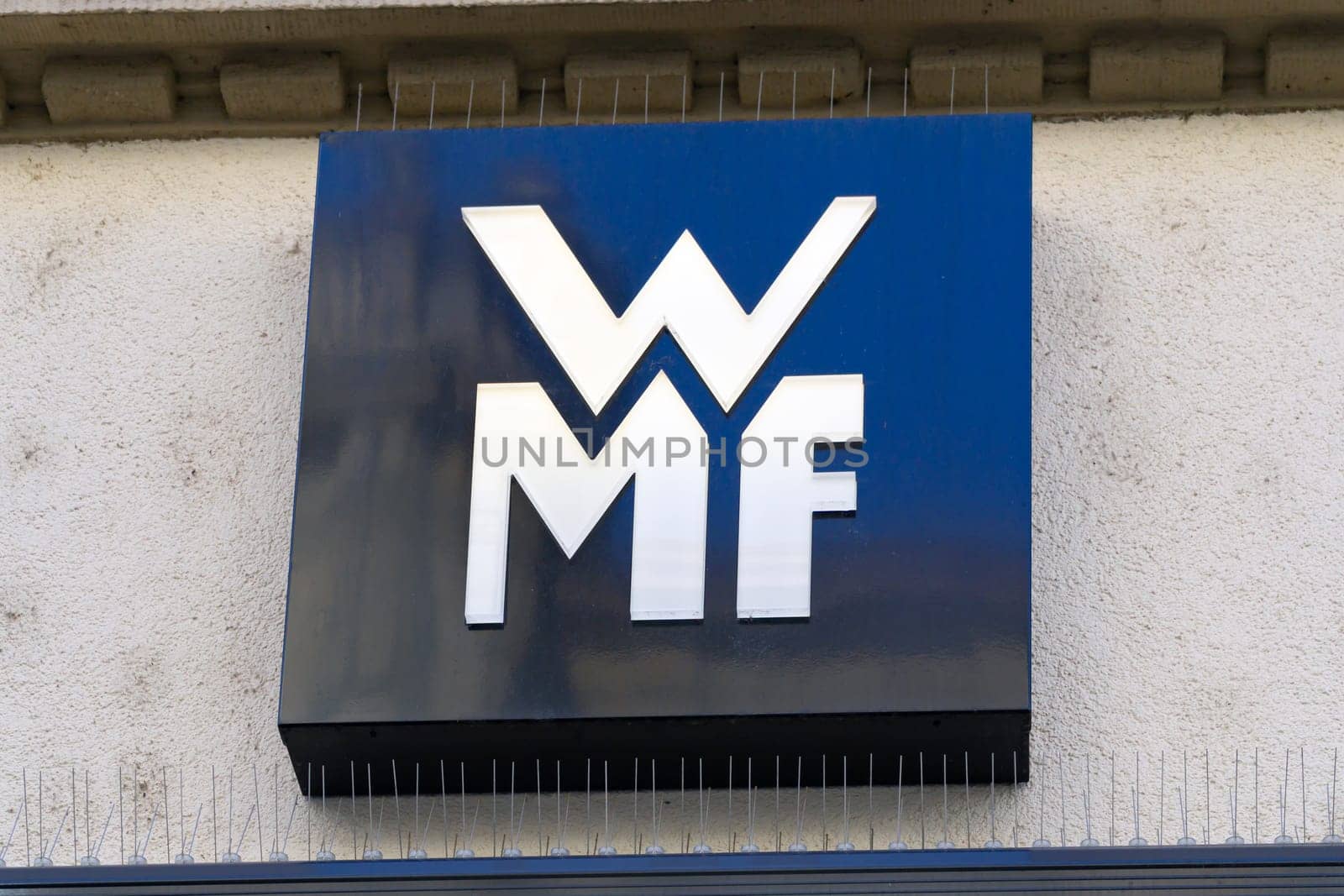 Wiesbaden, Germany - June 03 2018: WMF logo on a facade. Wuerttembergische Metallwarenfabrik is a German silverware manufacturer, headquartered at Geislingen an der Steige, Germany