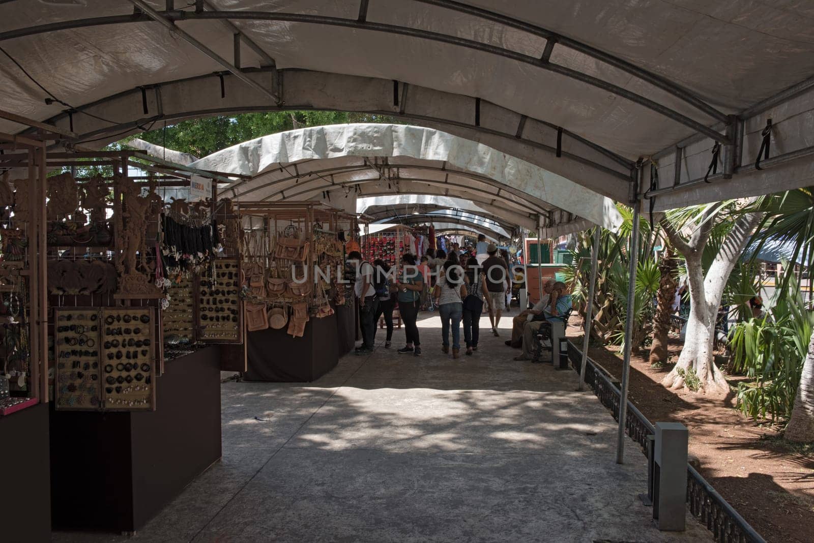 stalls at the street festival in the plaza de la Independencia the merida en domingo merida on sunday.
