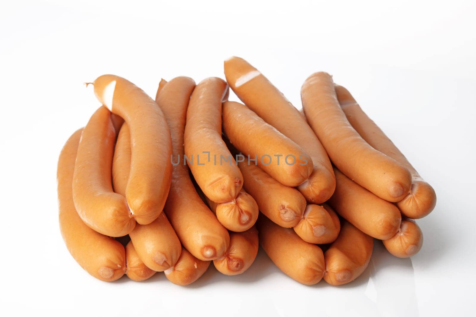 Fresh Frankfurter Sausages on white background