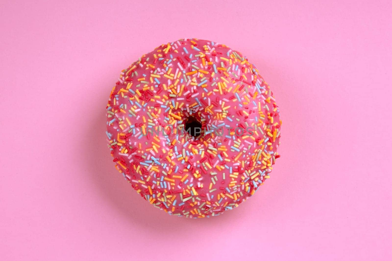 Delicious Donut on pink Background