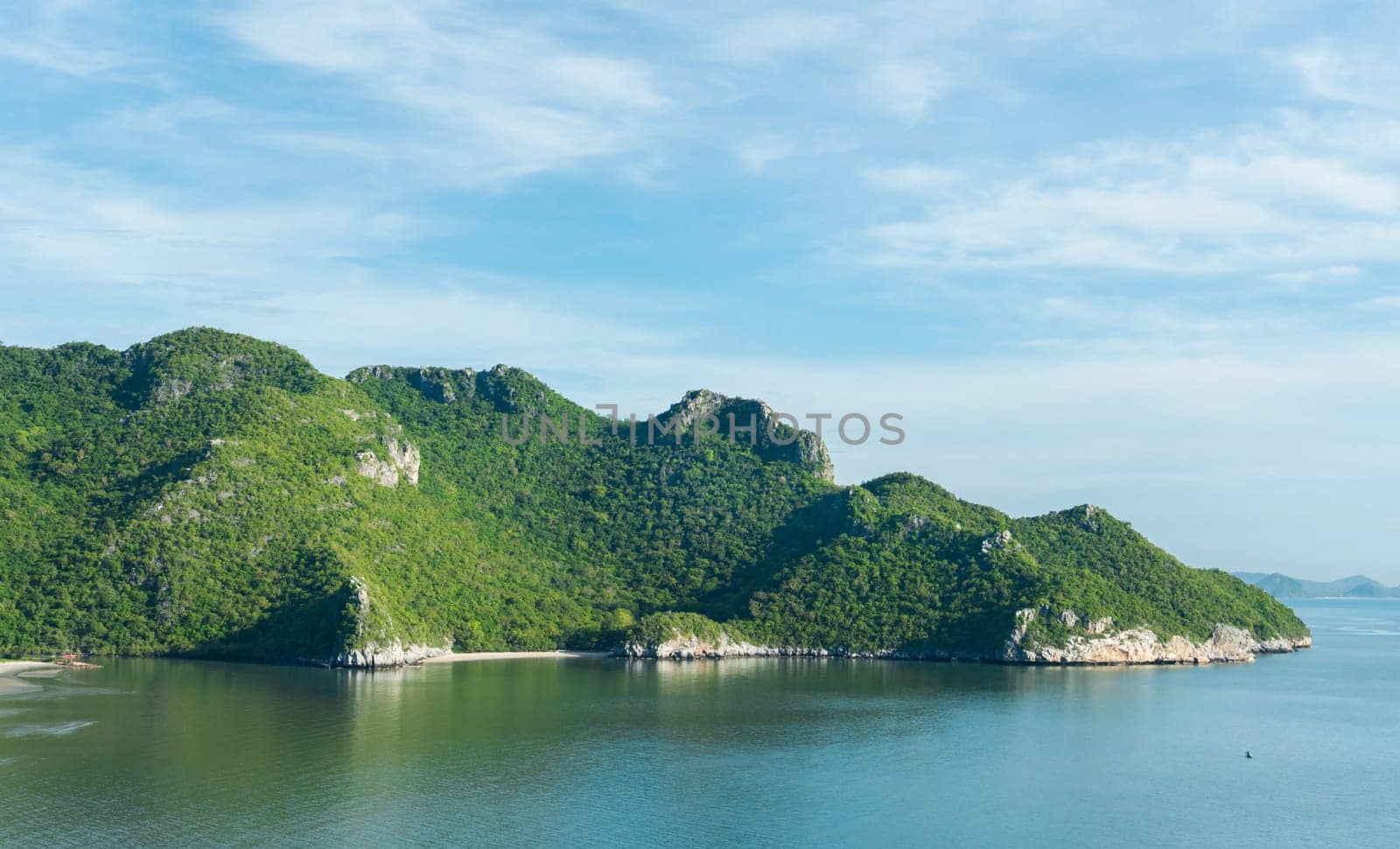 Green Rock or Stone Mountain or Hill and blue sky at Bang Pu Beach Prachuap Khiri Khan Thailand. Landscape or scenery summer season .concept
