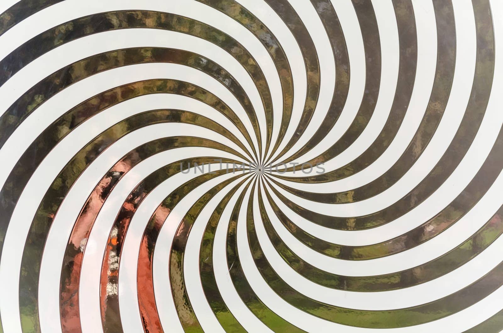 Close-up of a black and white spiral pattern.