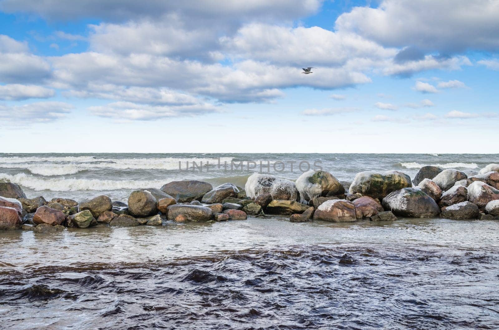 Sea waves breaking on the rocks, seascape