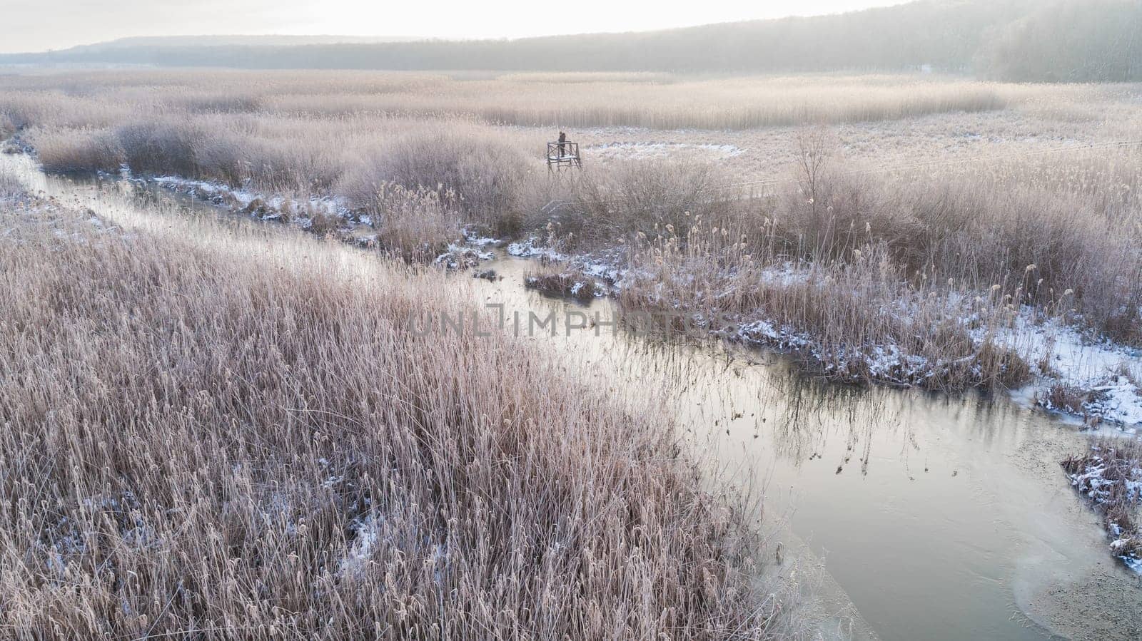 lake in winter. Location: Comana Natural Park, Romania. Aerial view