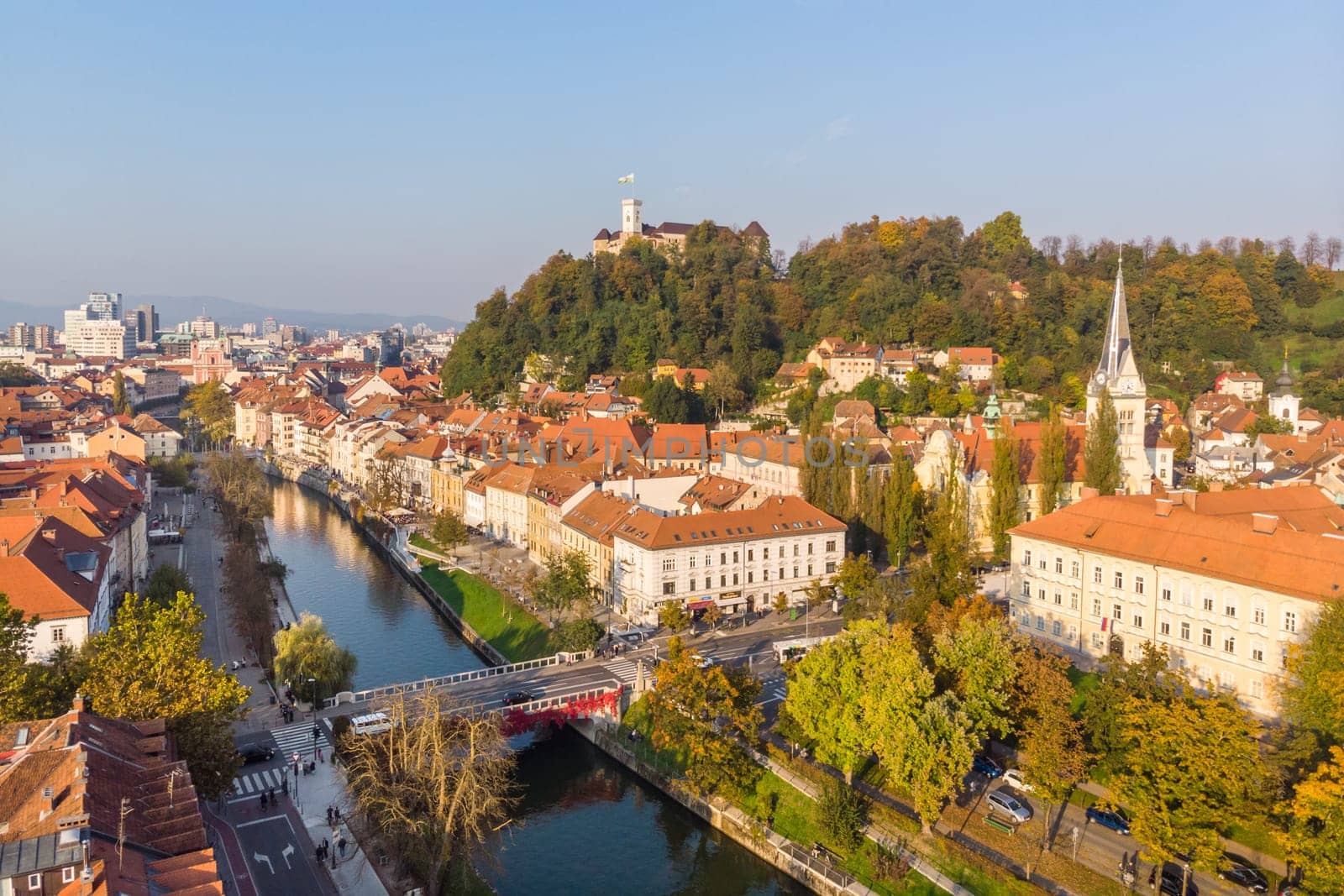 Aerial panoramic view of Ljubljana, capital of Slovenia in warm afternoon sun.