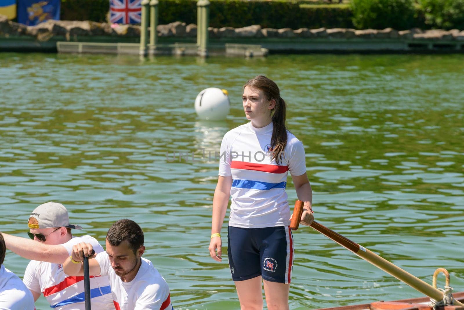 Rome, Italy - July 30, 2016: Dragon boat crews  compete at the european championships held in Italy in 2016 summer, English girl of the UK crew