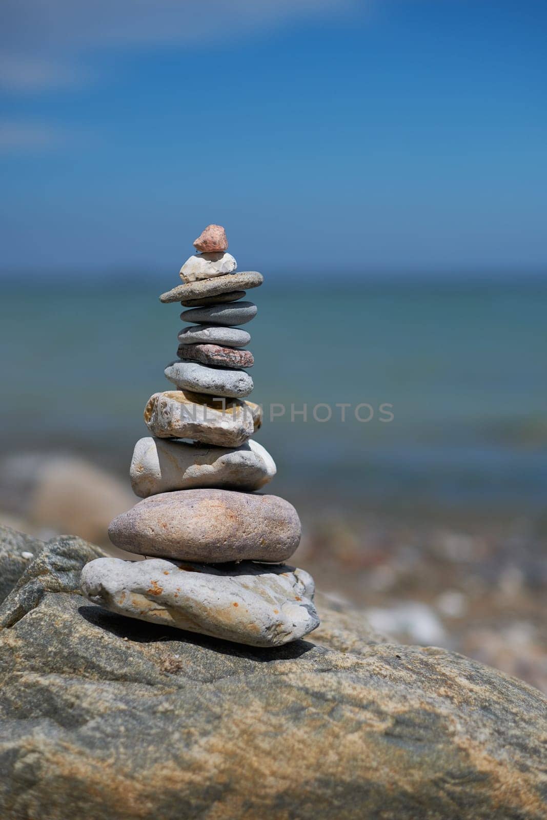 Stone tower on the Baltic Sea beach in Schleswig-Holstein - Germany - soft bokeh