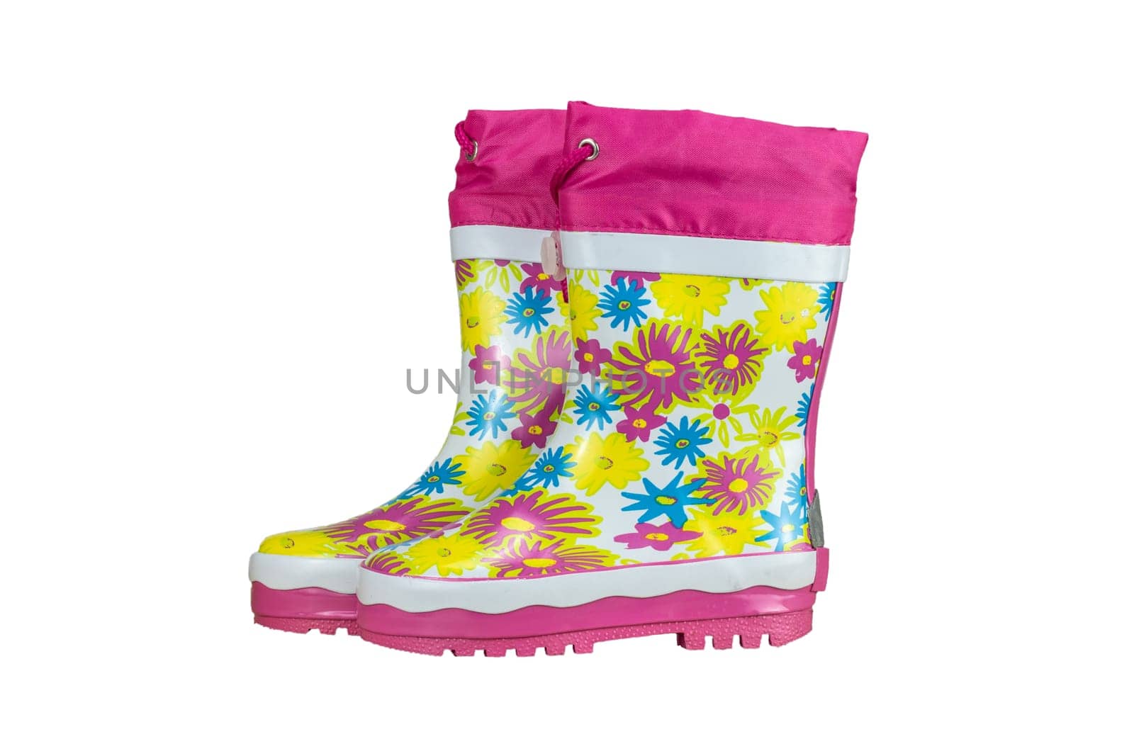 Children shoes and boots. Closeup of a pair pink rubber boots isolated on a white background. Kids shoes fashion.