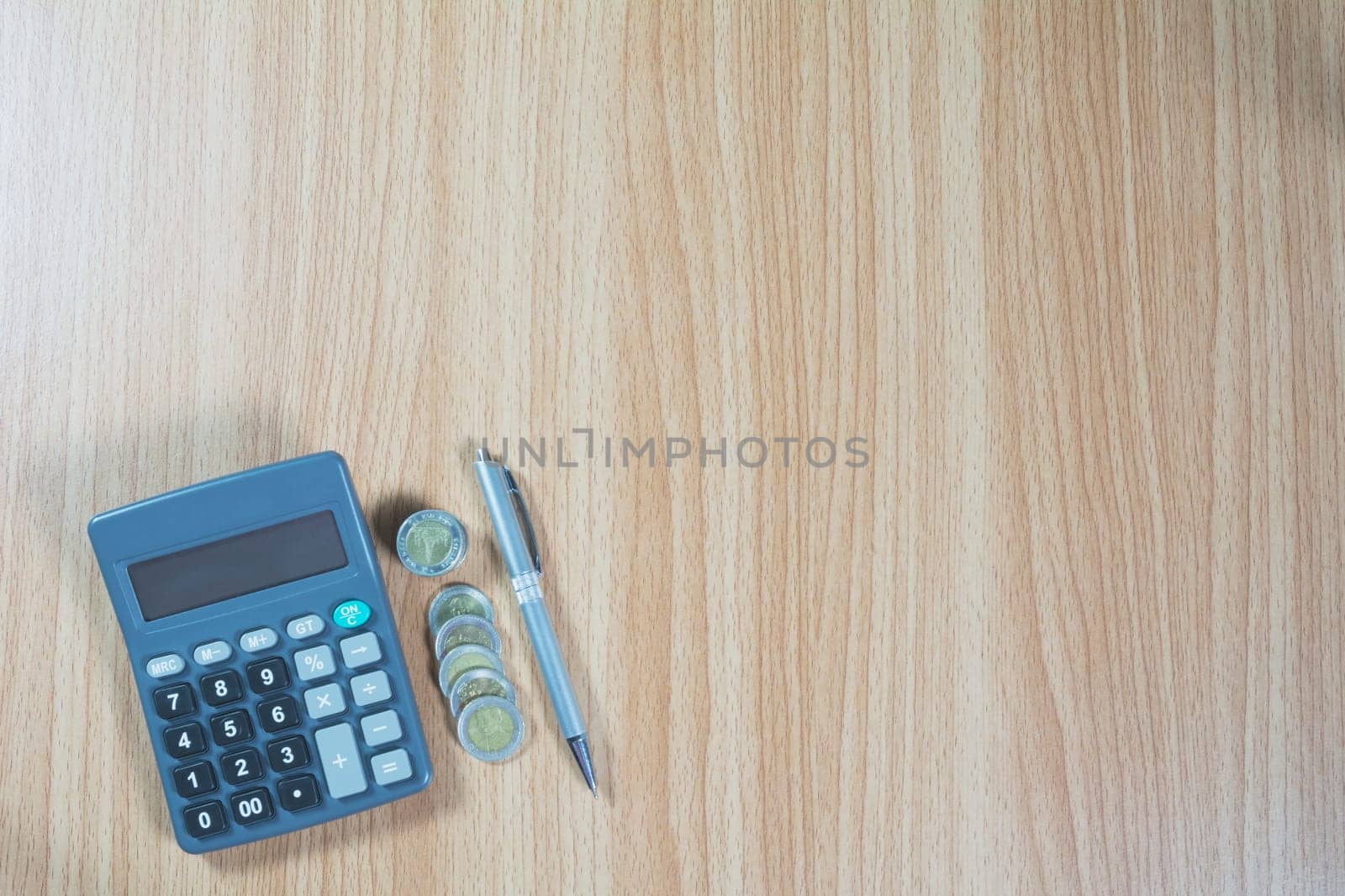 Top view of stock financial indices with stack coin and calculator. Financial stock market in accounting market economy analysis.