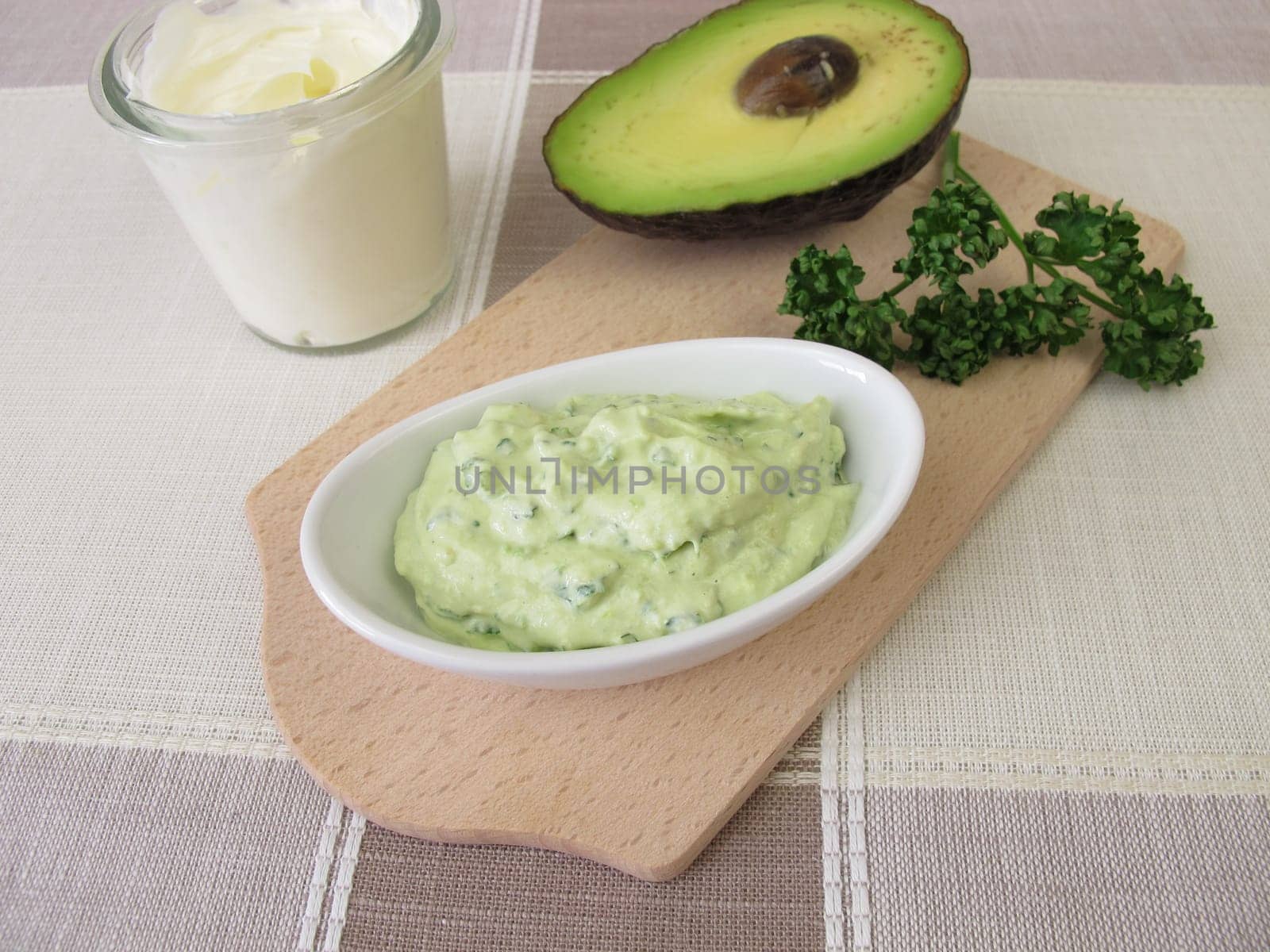 Guacamole with avocado, fresh cheese and parsley
