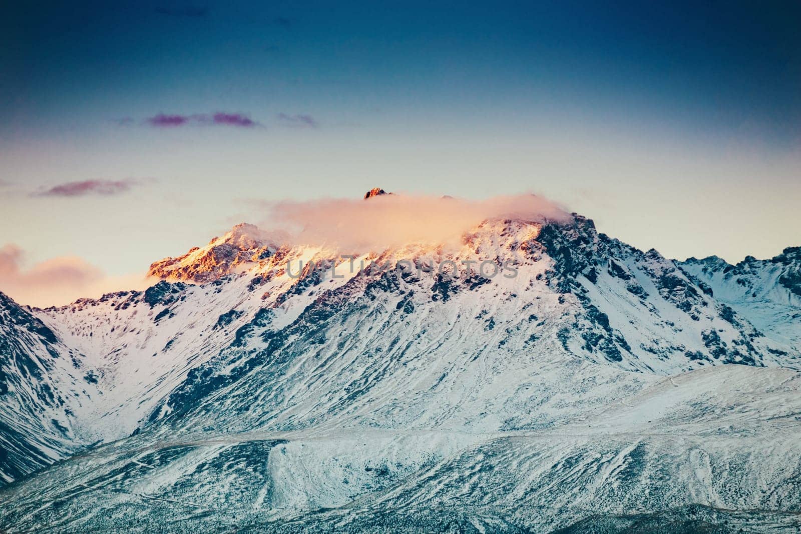 Snowcapped Mt. Cook Peak during Sunset in Mt. Cook National Park, magnificent rugged mountain with snow and ice, South Island, New Zealand