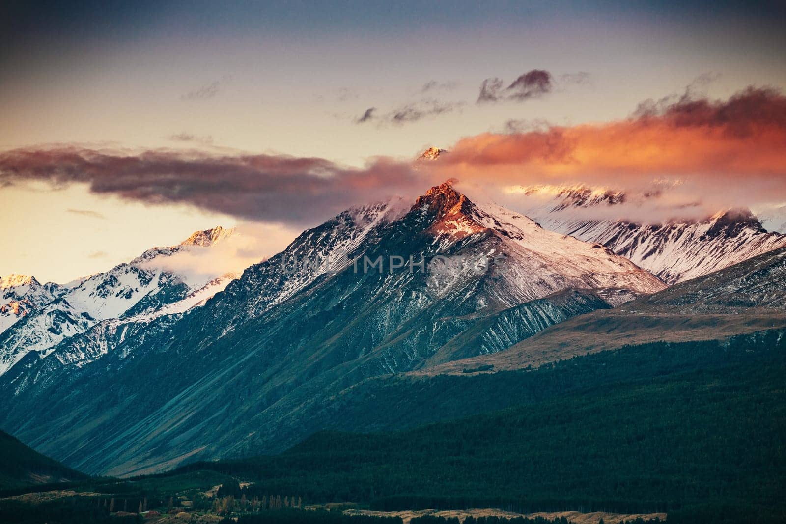 Snowcapped Mt. Cook Peak during Sunset in Mt. Cook National Park, magnificent rugged mountain with snow and ice, South Island, New Zealand