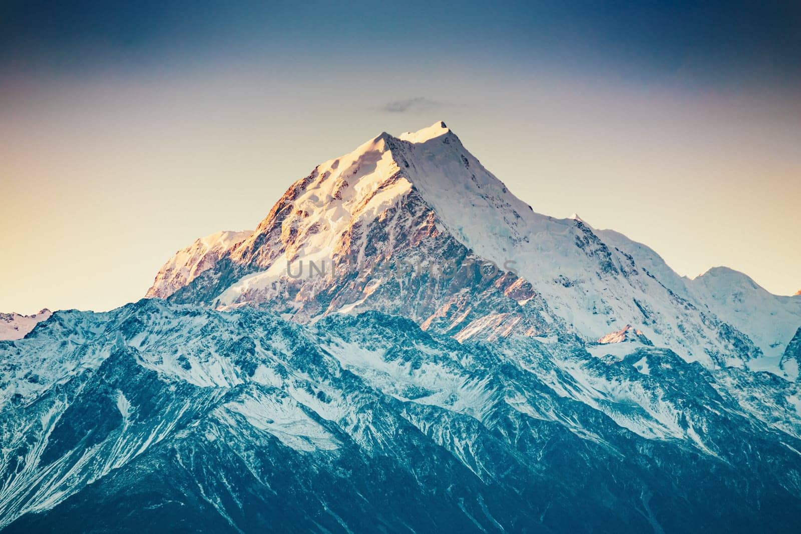 Snowcapped Mt. Cook Peak during Sunset in Mt. Cook National Park, magnificent rugged mountain with snow and ice, South Island, New Zealand