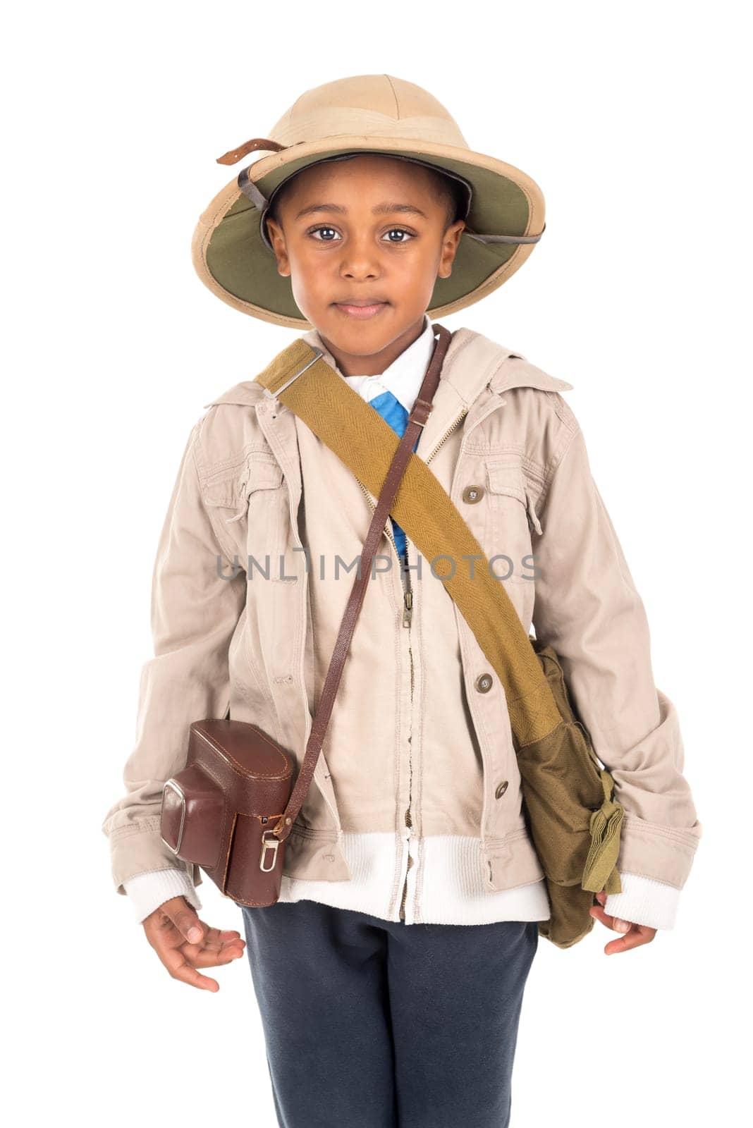 Young boy with a camera playing Safari isolated in white