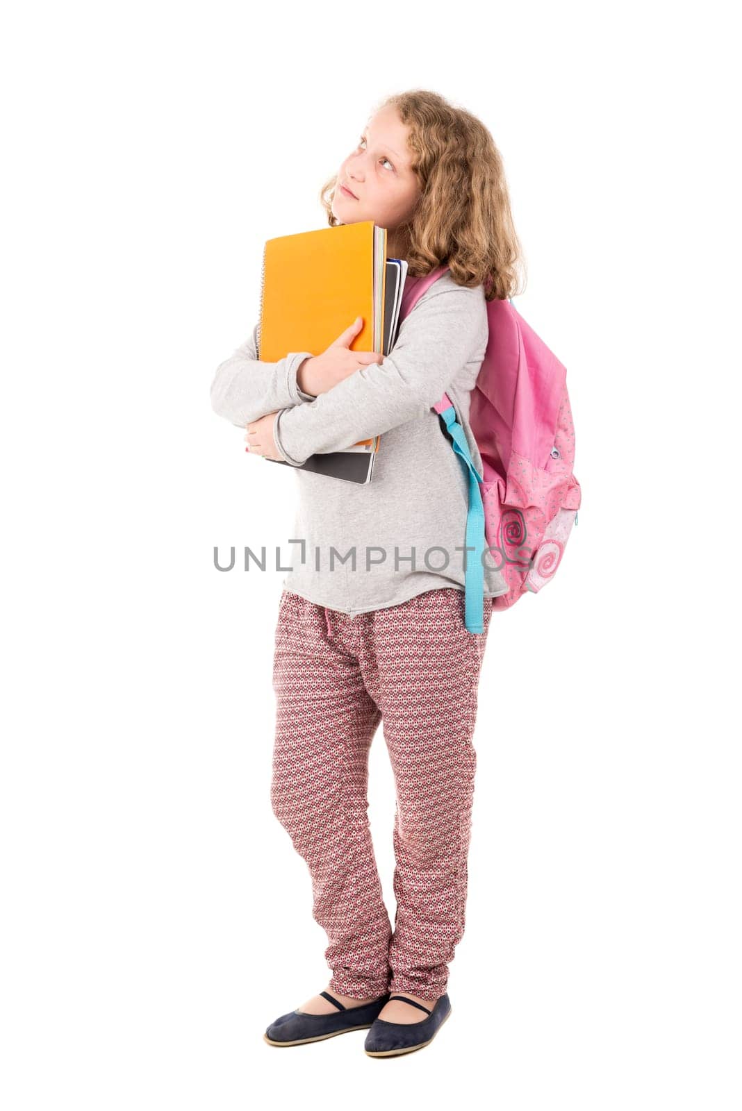 Young girl student posing isolated in white