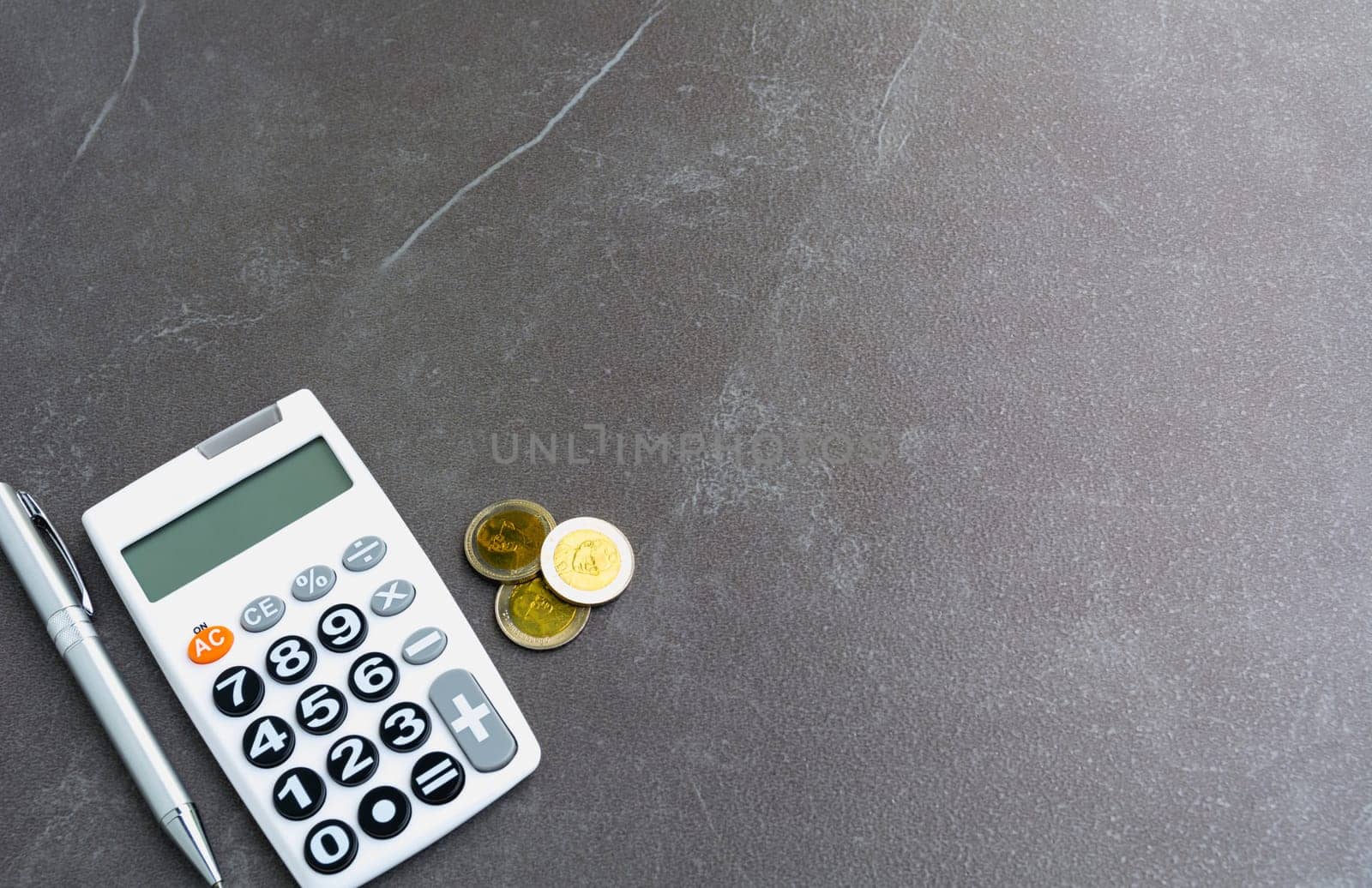 Stock financial indices with stack coin and calculator and copy space for insert text. Financial and accounting concept.