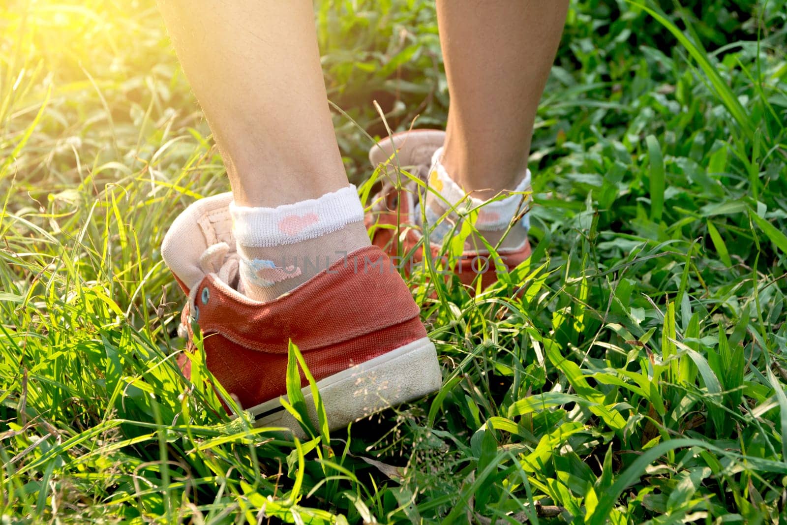 Male walking at the morning for warm up body for jogging and exercise.