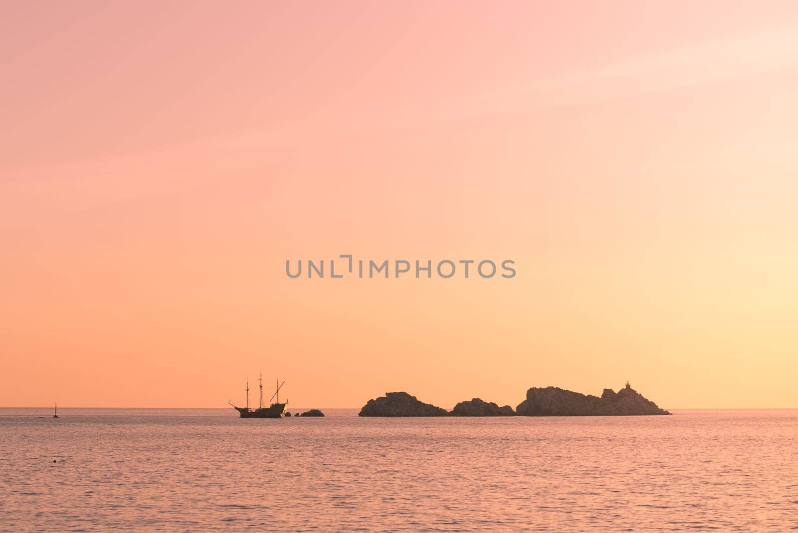 Sunset over the rocky Croatian coast in Dubrovnik, Croatia