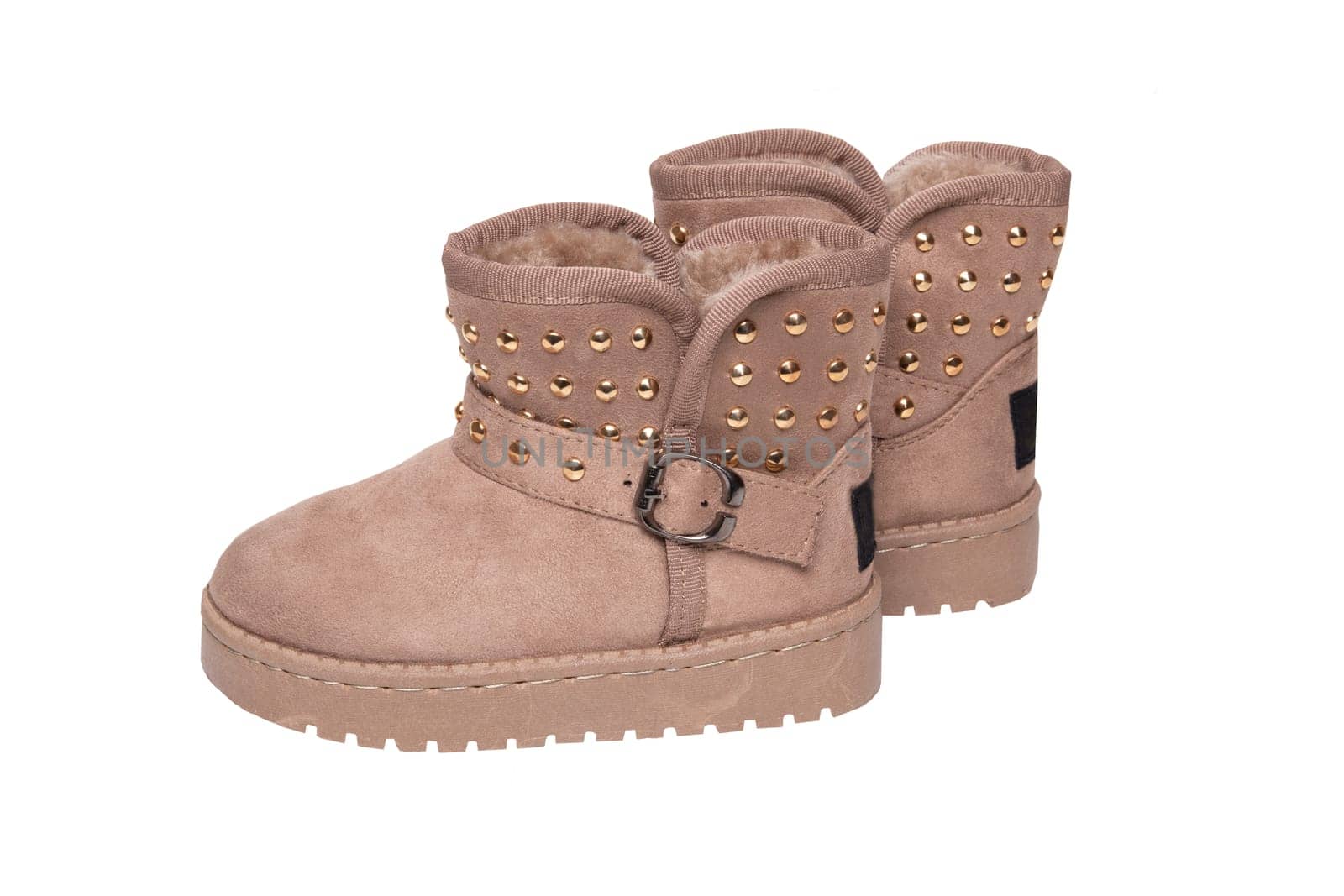 Winter boots. A pair brown suede leather winter boots and lined with fur.  Isolated on a white background. Shoe fashion new collection winter 2018 to 2019.