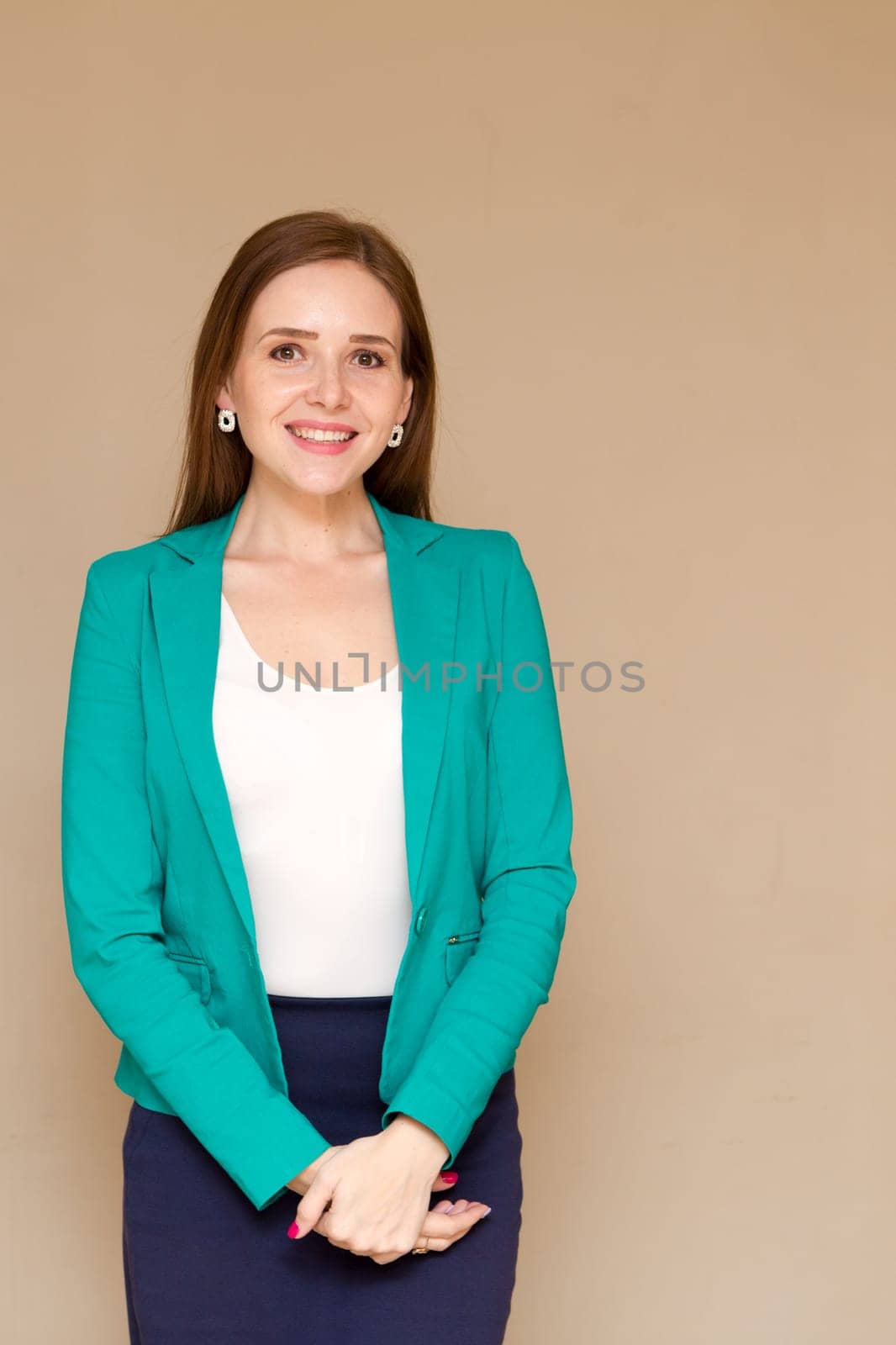 Happy beautiful business woman with clipboard in the office.