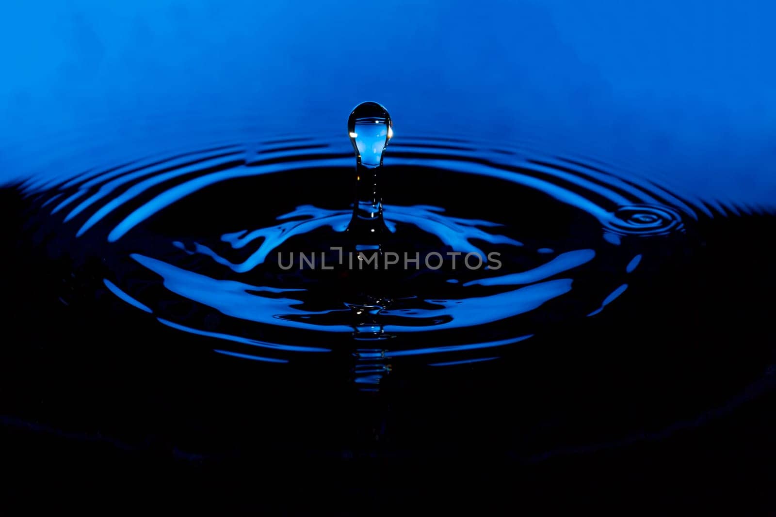 Water Droplet with Ripples blue and black.