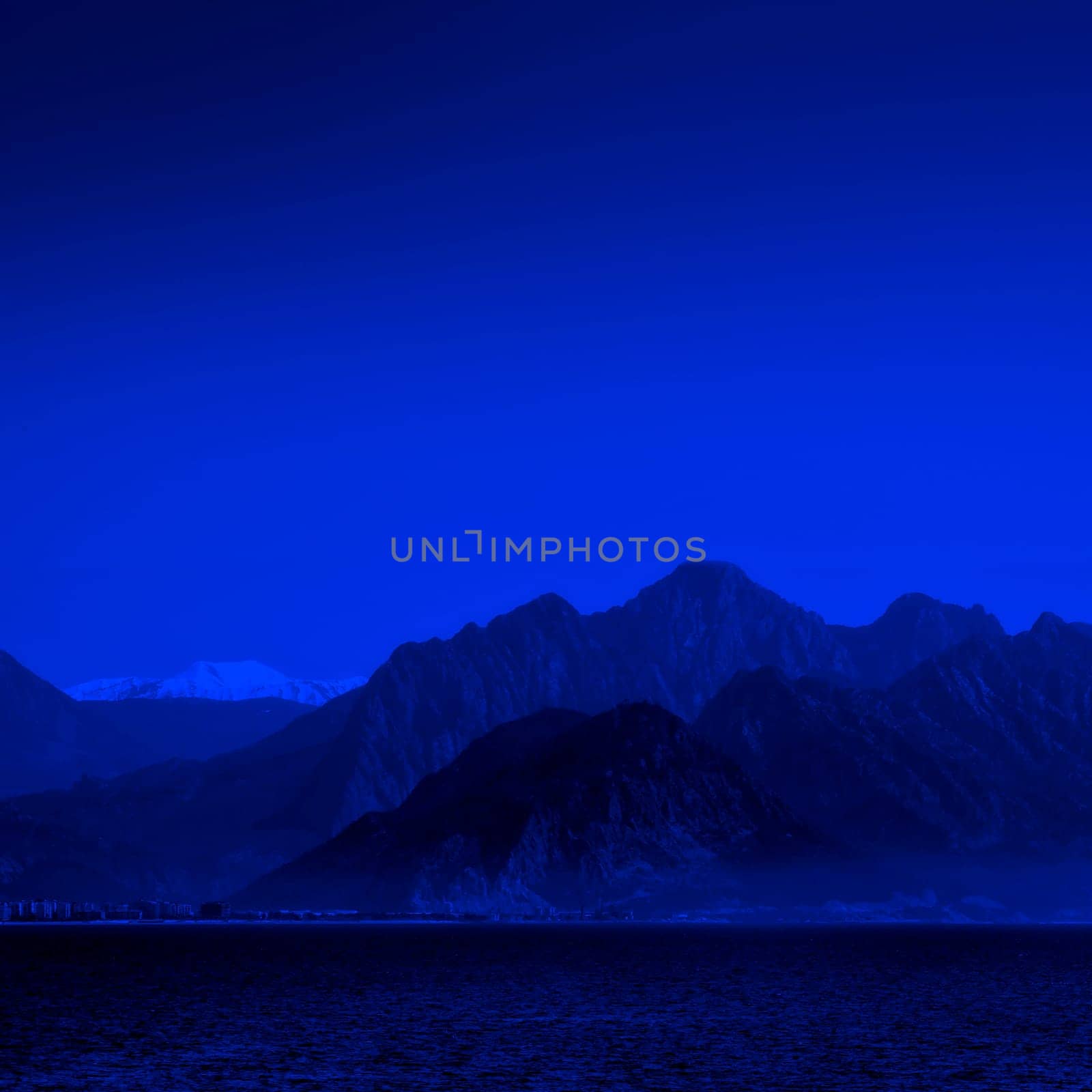 landscape image of high mountains over clear sky in Antalya, Turkey